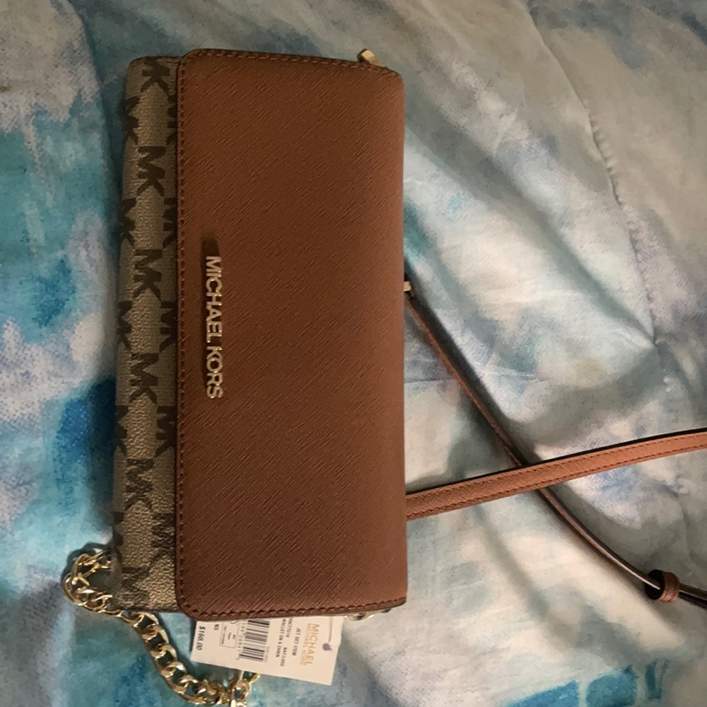 MK wallet with shoulder strap